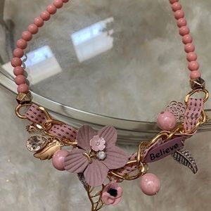 A beautiful necklace that says believe!